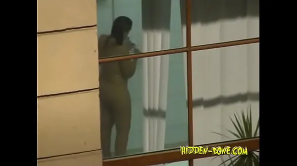 Hot A girl washes in the shower, and we see her through the window my Tube