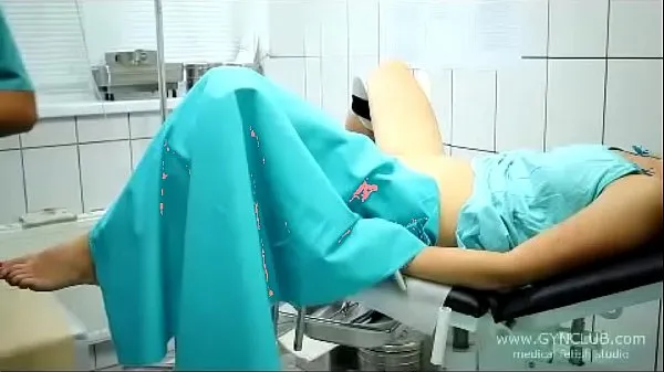 beautiful girl on a gynecological chair (33 Tüpümü sıcak tut